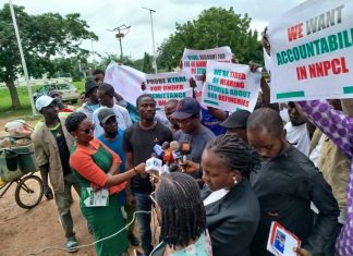 Protests rock Abuja over fuel scarcity as protesters demand sacking of NNPC boss, Kyari (Photos)